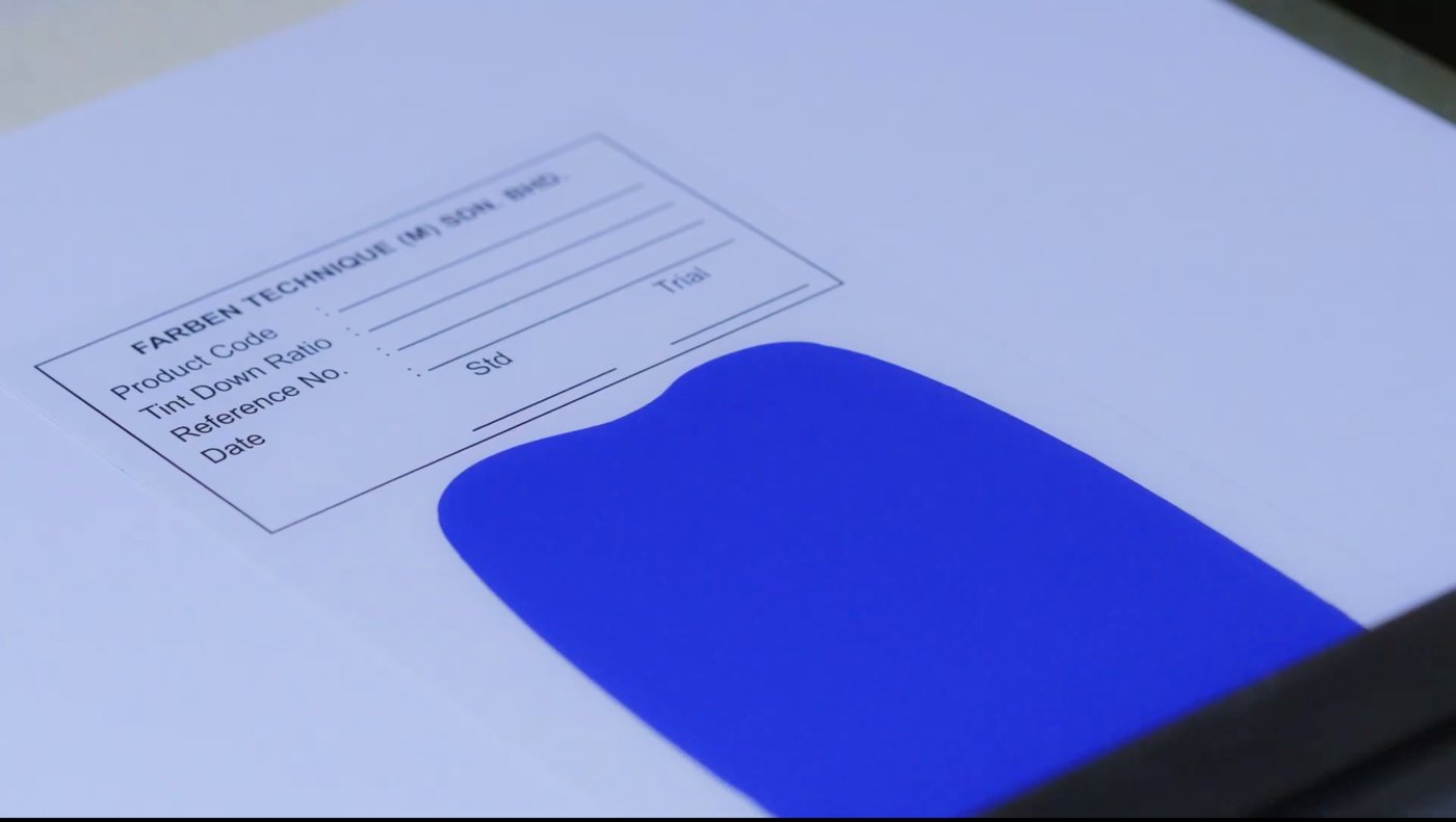 Farben colour matching card with a blue drawdown, standard against trial